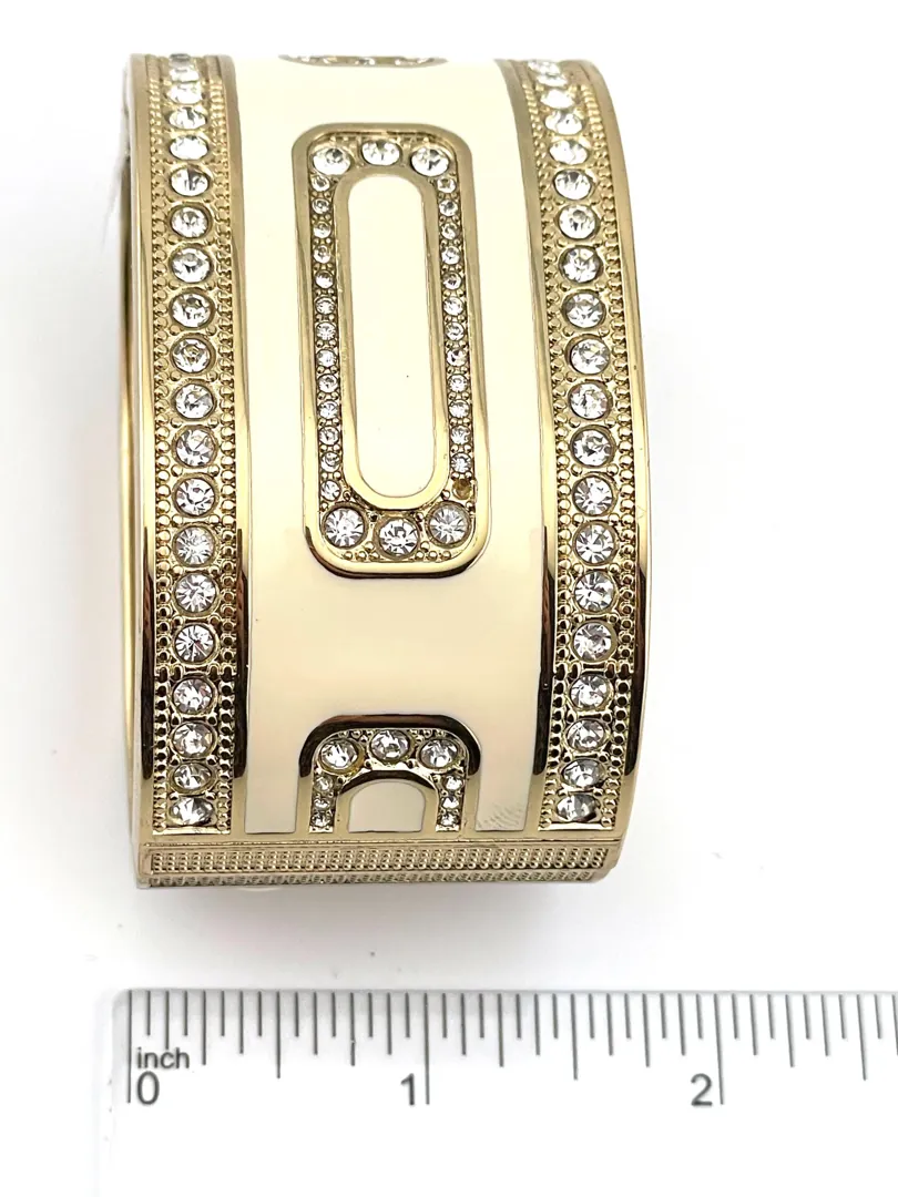 Pierre Lorren Greek Key Infinity Bracelet: Success, Eternal Life. Greek key jewelry featuring an ancient Greek design. Greek bracelet bangle made of 18k gold and silver.