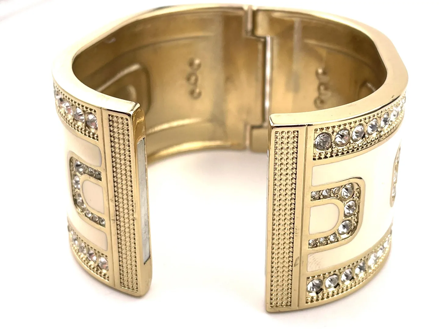 Pierre Lorren Greek Key Infinity Bracelet: Success, Eternal Life. Greek key jewelry featuring an ancient Greek design. Greek bracelet bangle made of 18k gold and silver.