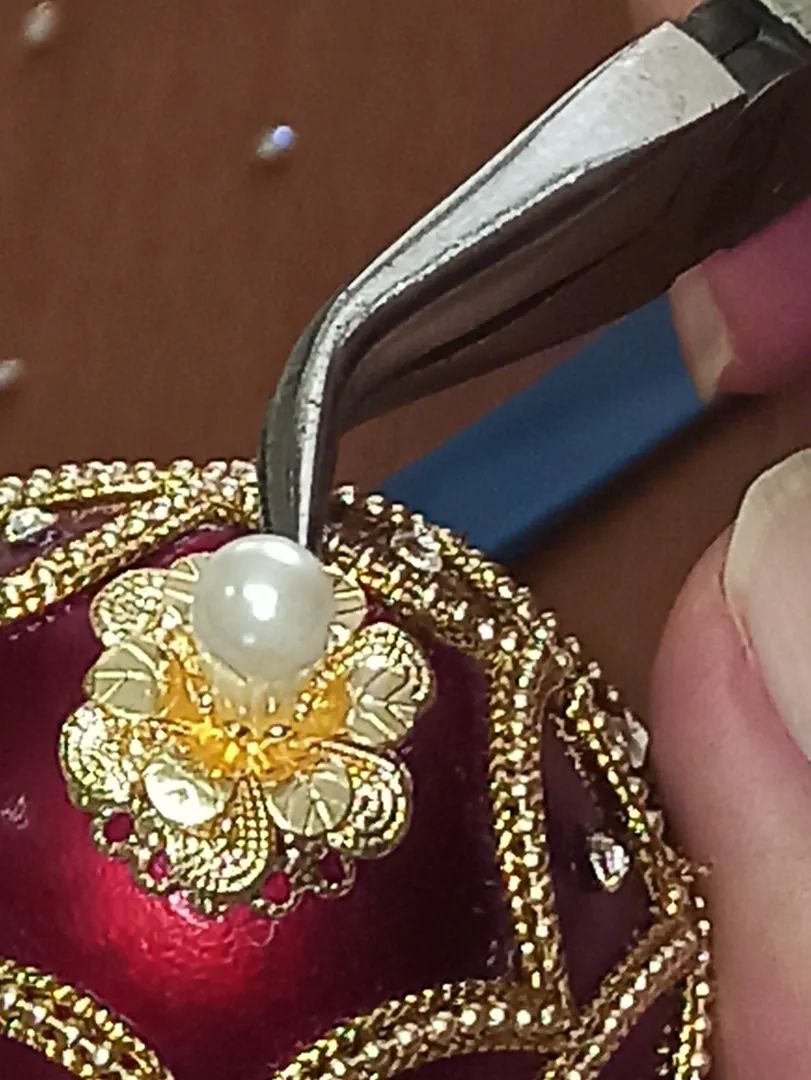 Mother's Day gift from daughter: Red Fabergé egg music box trinket and Fabergé-style egg pendant. Perfect for wife’s birthday, mom gift, sister's anniversary, or as a gift for a wife.