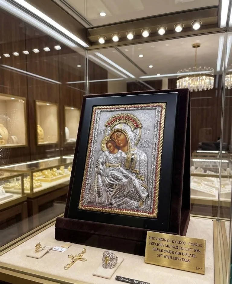 Virgin Mary Kykko Byzantine icon in wood round frame. A Greek Orthodox gift, this handmade piece from Greece features sterling silver and ruby accents. Perfect as a religious present.